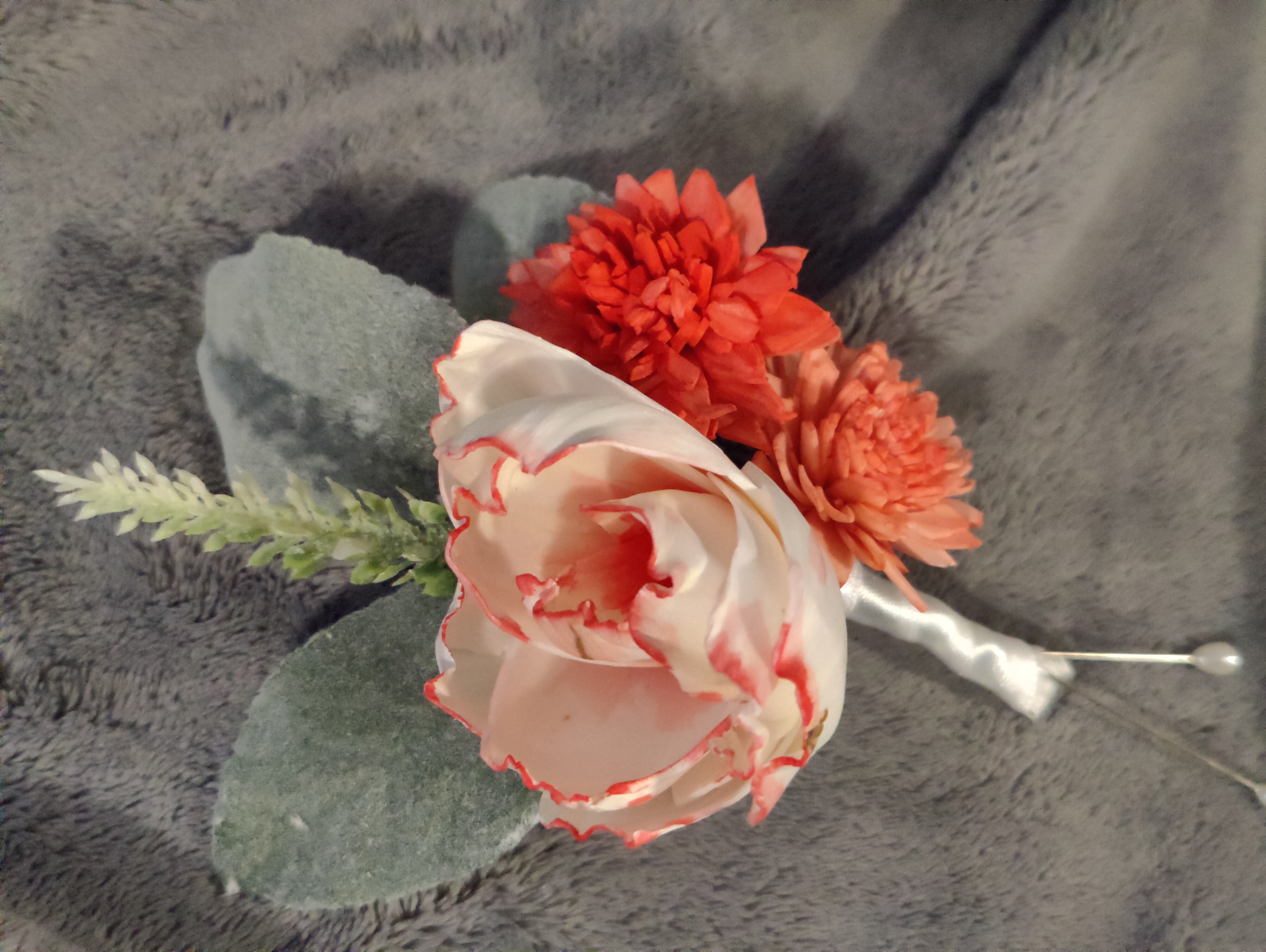 ruffled white and red peony bouttonierre